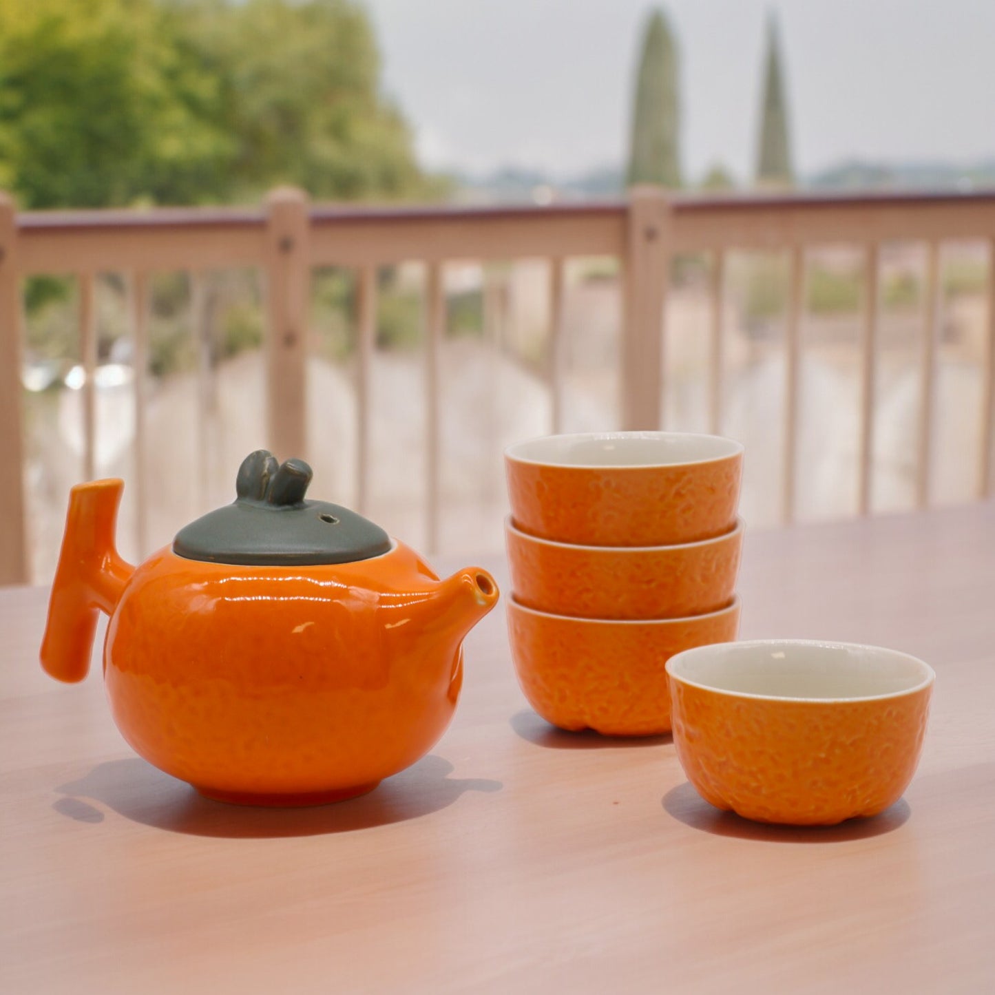 Orange Teapot Set with Four Matching Cups