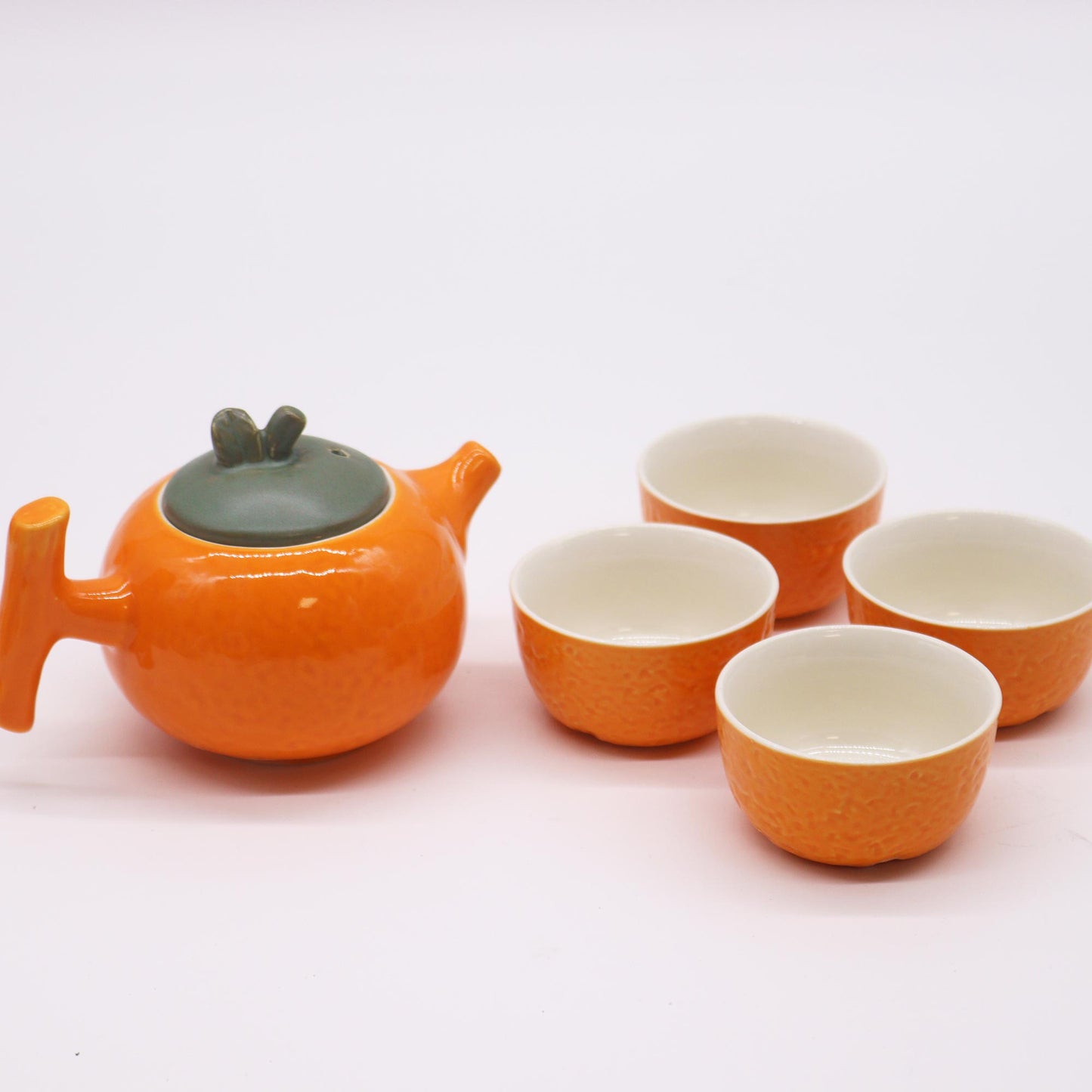 Orange Teapot Set with Four Matching Cups